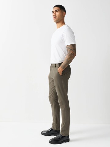 Next - Slimfit Calças chino em castanho