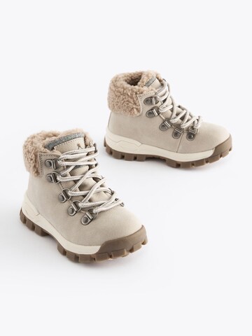 Bottes Next en beige