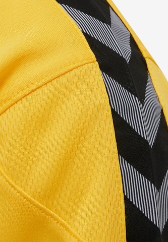 Hummel - Camiseta funcional en amarillo