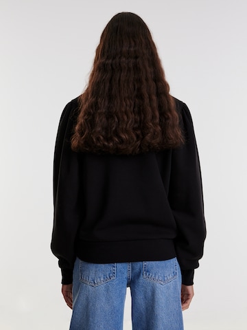 EDITED Sweatshirt 'Tamy' in Black