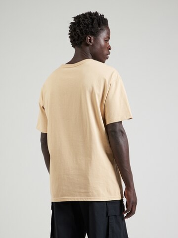 Nike Sportswear Μπλουζάκι 'Premium Essentials' σε μπεζ