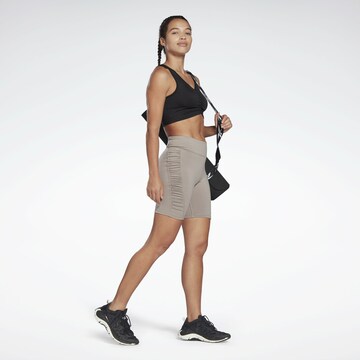 Skinny Pantaloni sportivi di Reebok in grigio