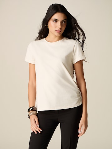 T-shirt oltre en beige