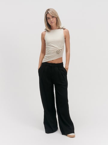 Top di millane in beige