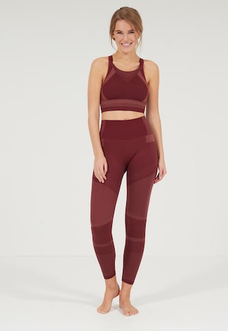 Athlecia Skinny Workout Pants 'SEMARAN SEAMLESS' in Red