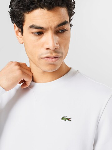 Sweat-shirt LACOSTE en blanc