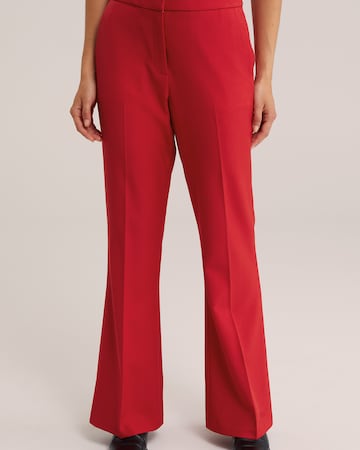 WE Fashion Bootcut Pressveckad byxa i röd
