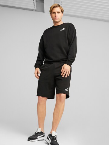 PUMA Tracksuit in Black: front