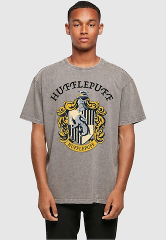 ABSOLUTE CULT Shirt 'Harry Potter - Hufflepuff Crest' in Grijs: voorkant