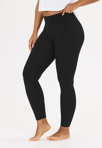 Athlecia Skinny Sports trousers 'Emarri' in Black: front