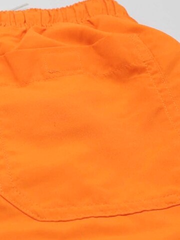 Surf Monkey - Bermudas en naranja