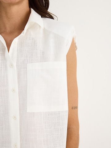 Bianco Lucci - Blusa en blanco