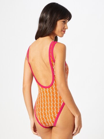 Calvin Klein Swimwear Bustier Badpak in Oranje