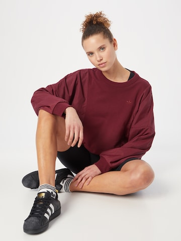 ADIDAS ORIGINALS Sweatshirt 'Premium Essentials Nylon Hybrid' in Rood