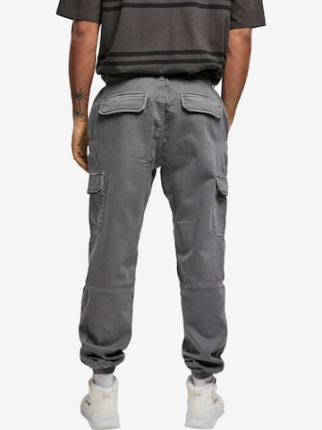 Urban ClassicsTapered Cargo hlače - siva boja
