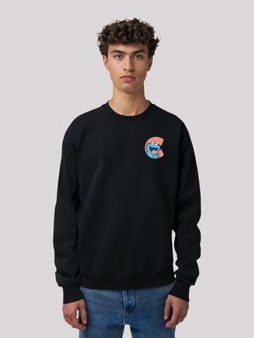 F4NT4STIC Sweatshirt 'Sesamstraße Cookie Monster' in Black: front