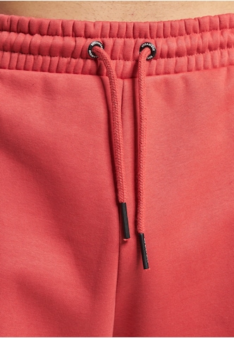 ROCAWEAR Regular Trousers in Red