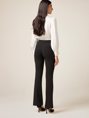 évasé Pantalon oltre en noir