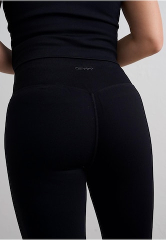 évasé Pantalon de sport Aim'n en noir