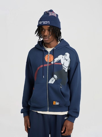 Veste de survêtement AND1 en bleu : devant