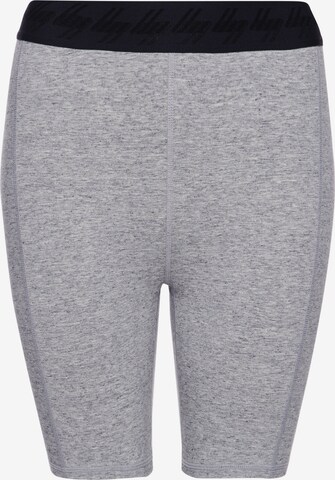 Skinny Pantalon de sport Superdry en gris : devant