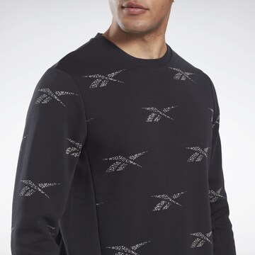 ReebokSportska sweater majica 'Identity Vector' - crna boja