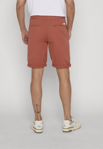 INDICODE JEANS Normalny krój Chinosy 'Canva' w kolorze pomarańczowy