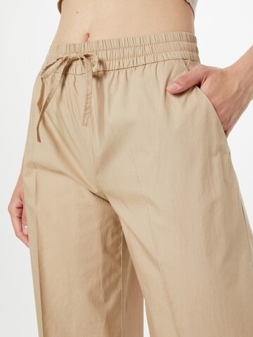 s.Oliver Wide leg Pressveckad byxa i beige