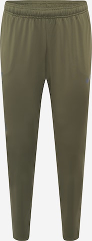 Pantaloni sport de la NIKE pe verde: față