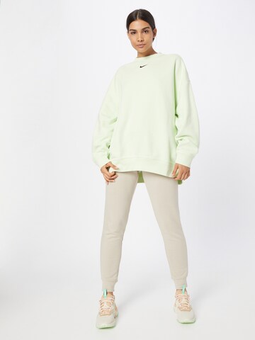Bluză de molton de la Nike Sportswear pe verde