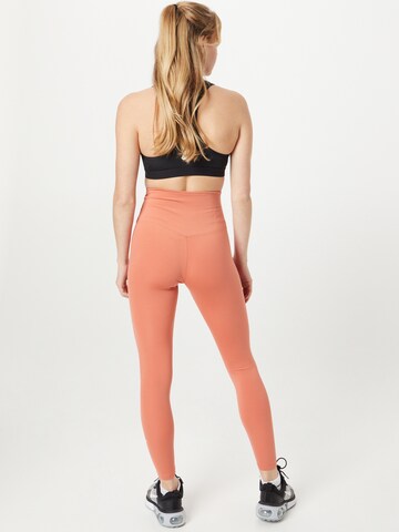 NIKE Skinny Sportbroek 'One' in Oranje