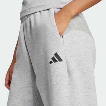 ADIDAS SPORTSWEAR Loosefit Sportovní kalhoty 'Future Icons' – šedá