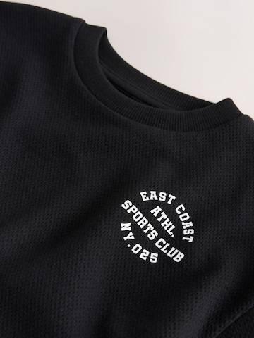 Next - Camiseta en negro