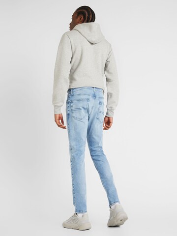 Coupe slim Jean 'AUSTIN SLIM TAPERED' Tommy Jeans en bleu