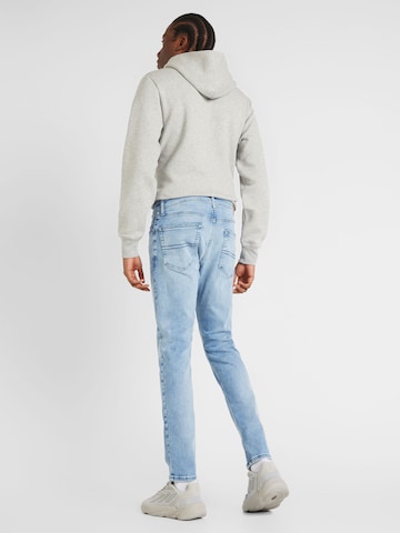 Coupe slim Jean 'AUSTIN' Tommy Jeans en bleu