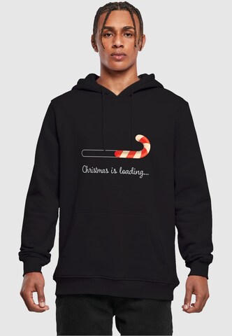 Merchcode Sweatshirt 'Christmas Loading' in Zwart: voorkant