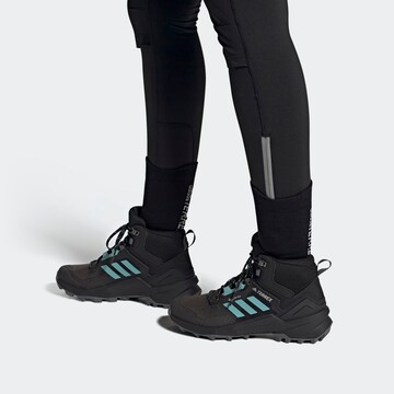 Boots 'Swift R3' di ADIDAS TERREX in nero