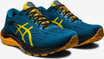 Chaussure de course ASICS en bleu