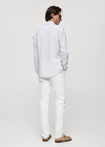 Coupe slim Jean 'Jan' MANGO MAN en blanc