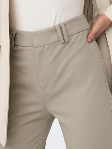 Flared Pantaloni con piega frontale 'PEACH' di ONLY in beige