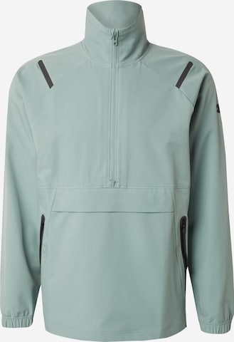 UNDER ARMOUR Urheilullinen collegepaita 'Unstoppable' värissä vihreä: etupuoli