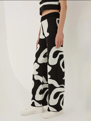 Hiccup - Perna larga Calças em preto