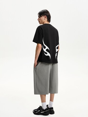 T-Shirt Bershka en noir