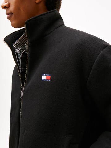 Tommy Jeans Φθινοπωρινό και ανοιξιάτικο μπουφάν 'ESSENTIAL' σε μαύρο