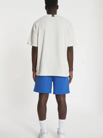 YSPT Studio Regular Sporthose 'Limitless' in Blau