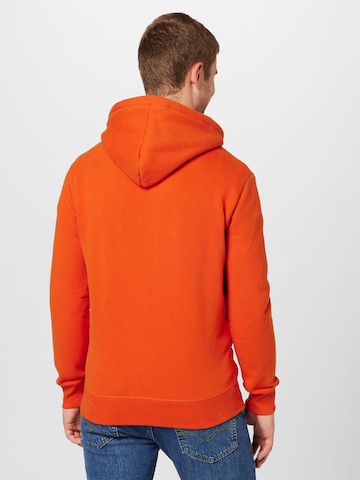 Superdry Jopa na zadrgo 'Essential' | oranžna barva
