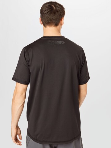 PUMA Sportshirt in Schwarz