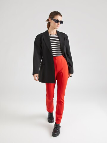 Coupe slim Pantalon TOMMY HILFIGER en rouge