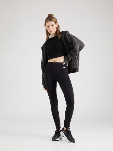 Skinny Leggings di Champion Authentic Athletic Apparel in nero