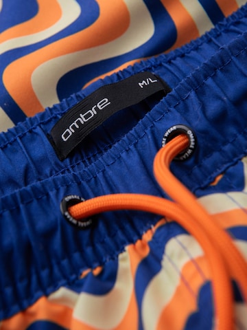 regular Pantaloni sportivi di Ombre in arancione